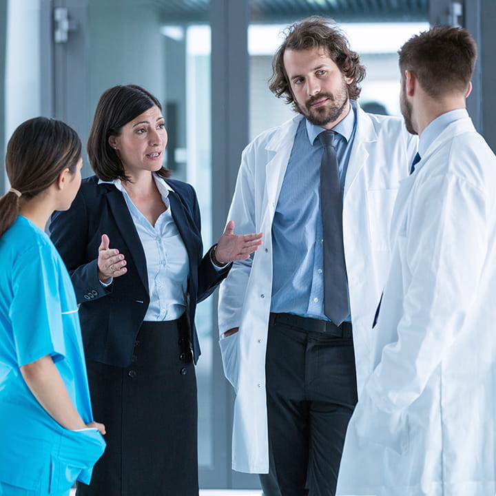 Businesswoman meeting doctors