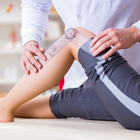 Orthopedic doctor with patient